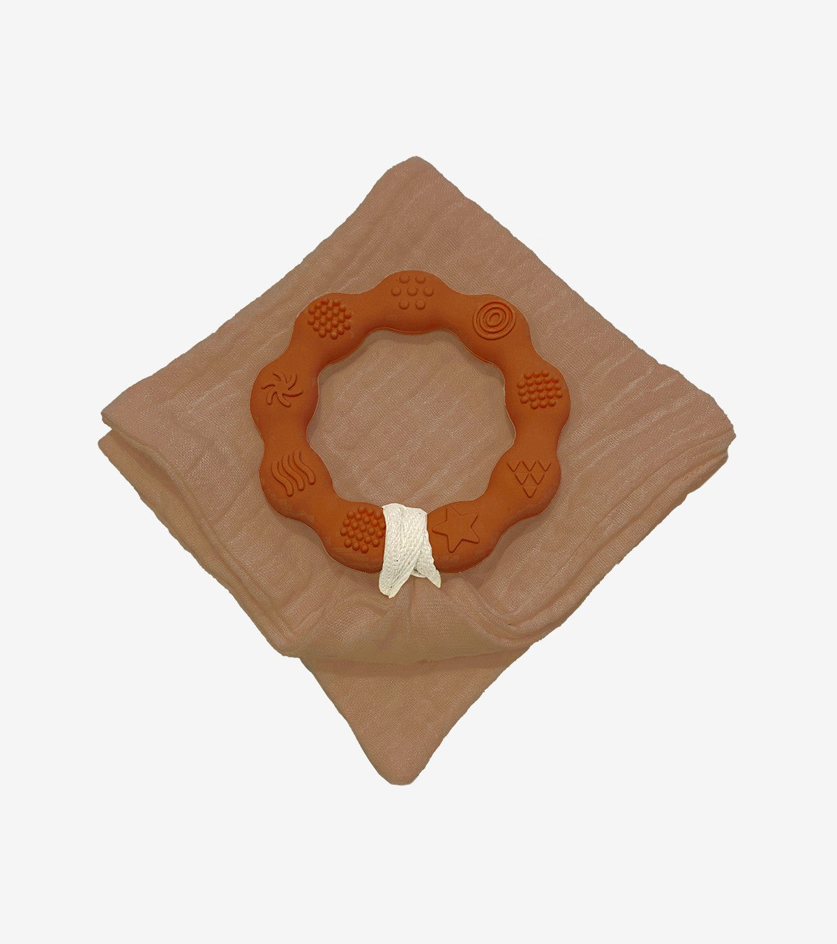 Brown teething ring and diaper