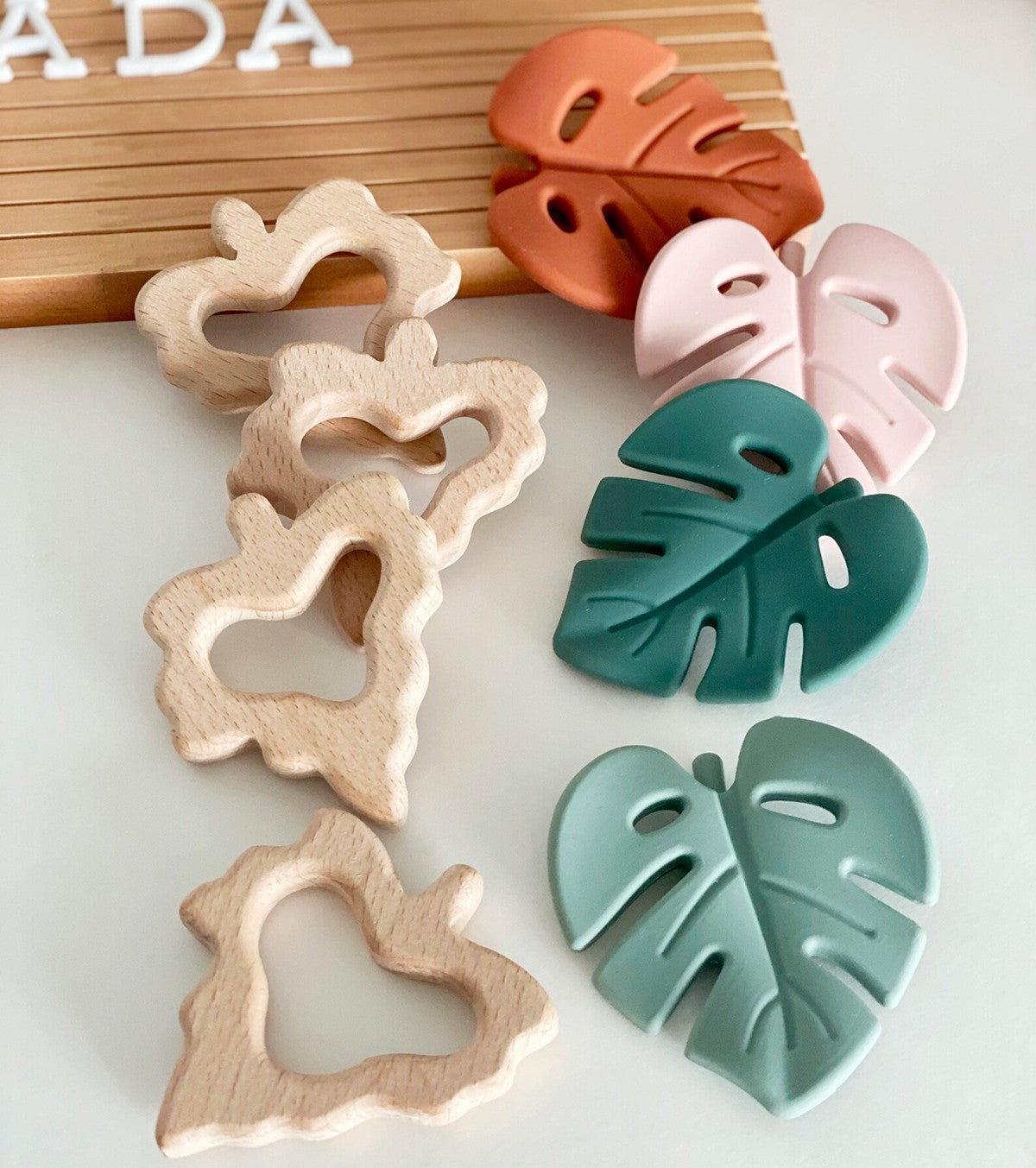 Teething ring with aqua leaf and diaper