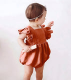 Ruffled romper - brick red