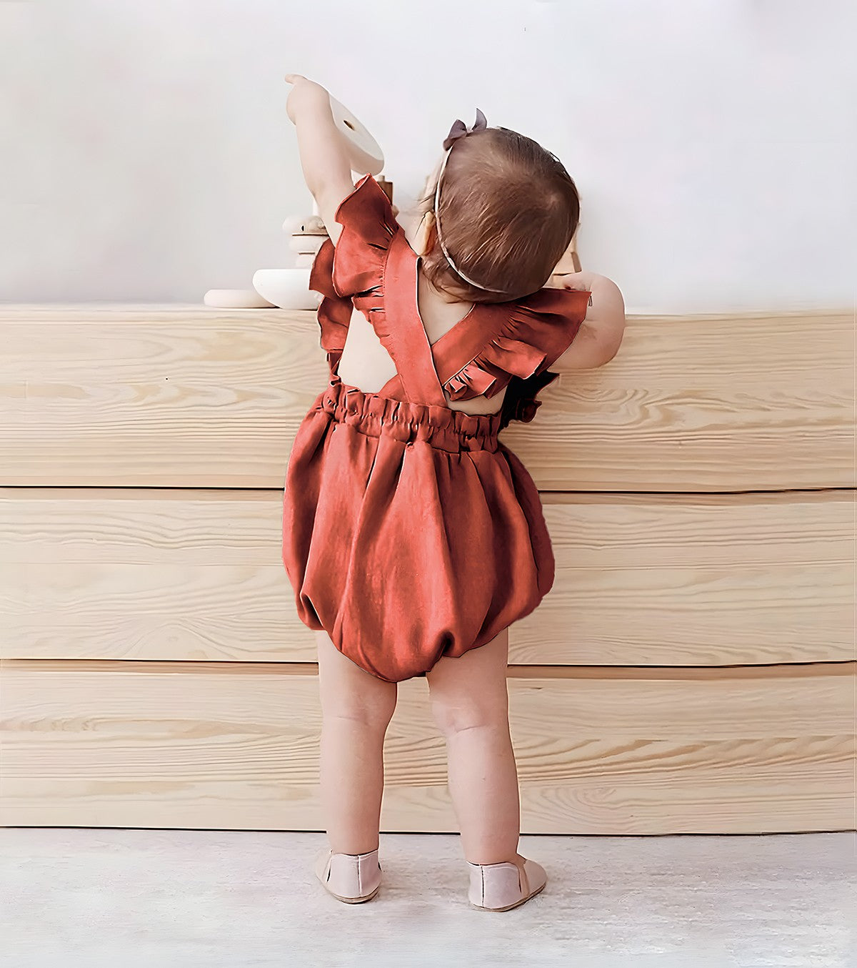 Ruffled romper - brick red